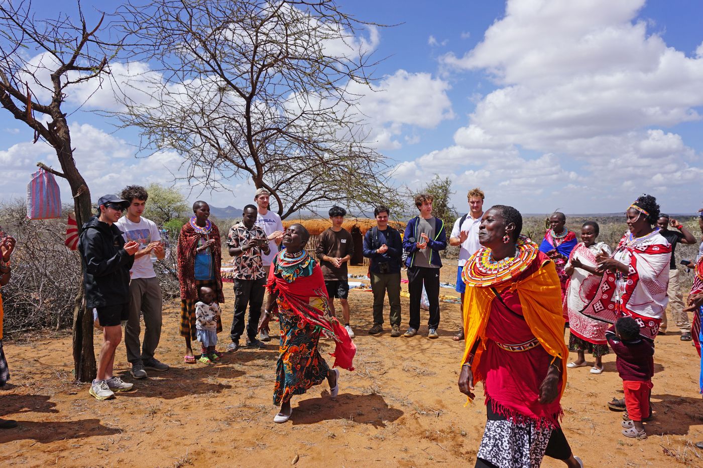 Mpala researchers and students with members of a neighboring community
