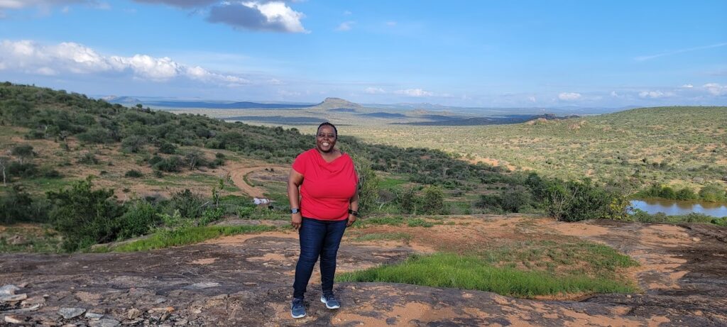 Dr. Wambiji at Baculi, a viewpoint at Mpala.